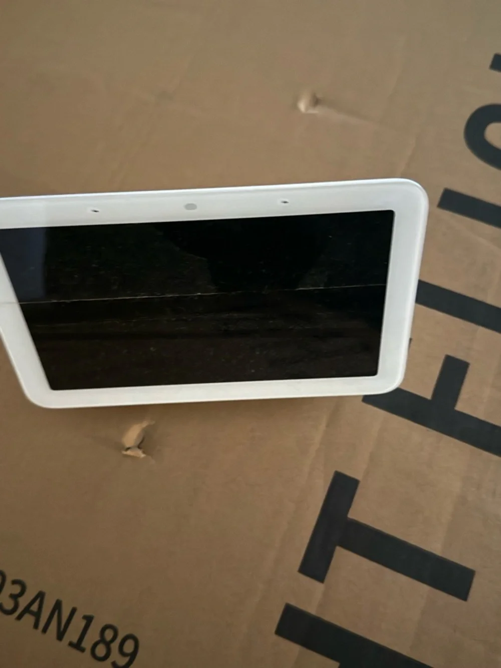 google Nest Hub smart display in white and light gray